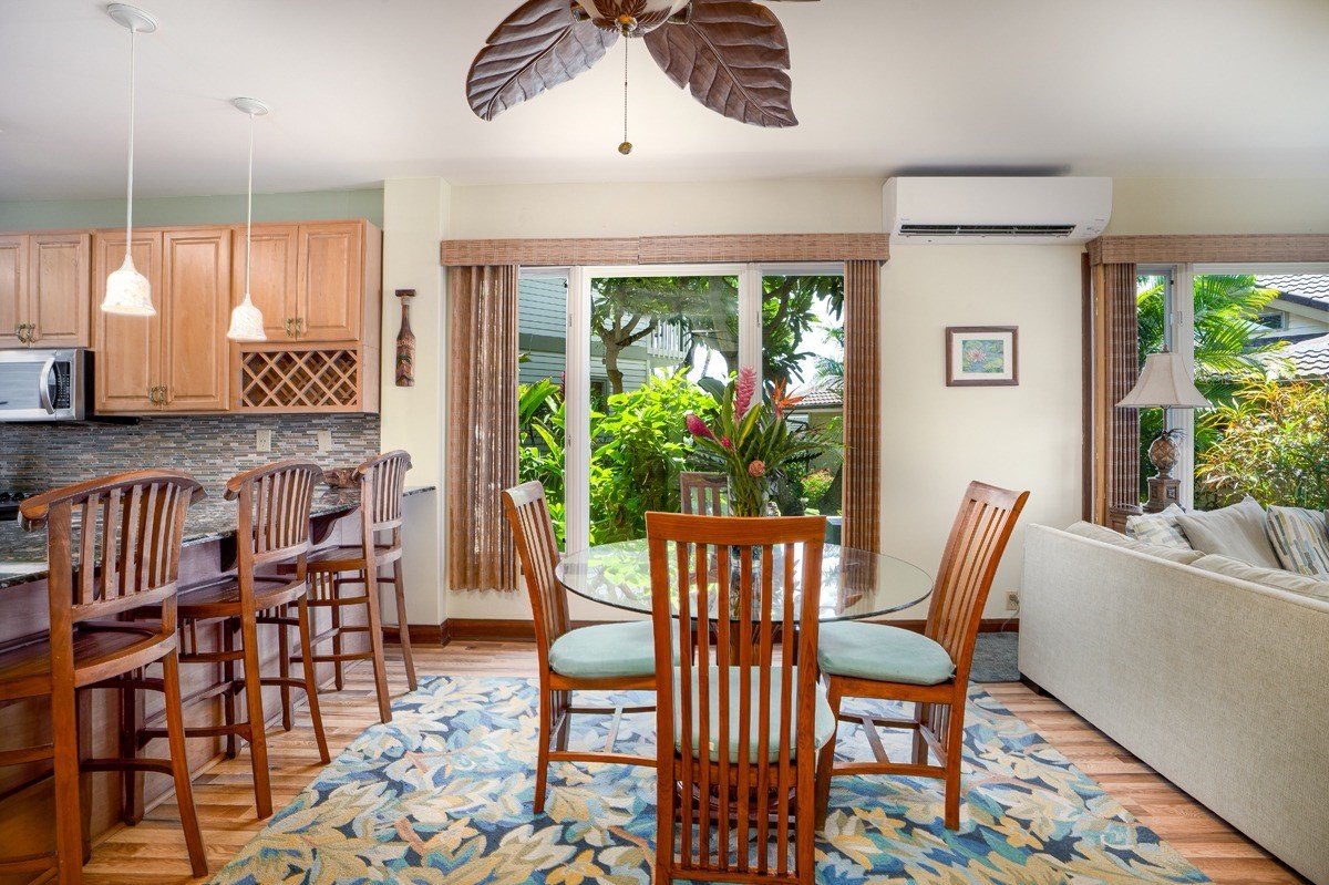 1871 Pe'e Road, Unit 2 Koloa, HI 96756 - Photo 4 of 25 a view of a dining room with furniture window and outside view