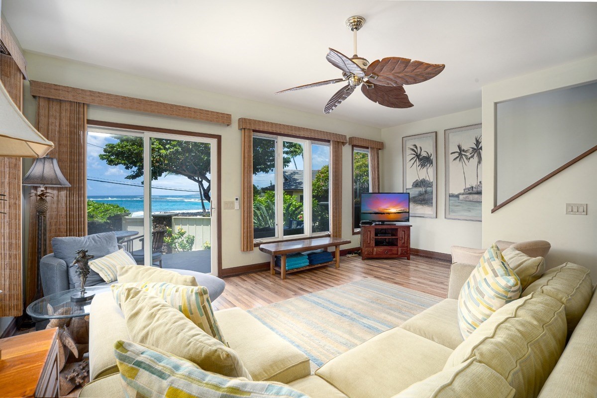 1871 Pe'e Road, Unit 2 Koloa, HI 96756 - Photo 7 of 25 a living room with furniture and a large window