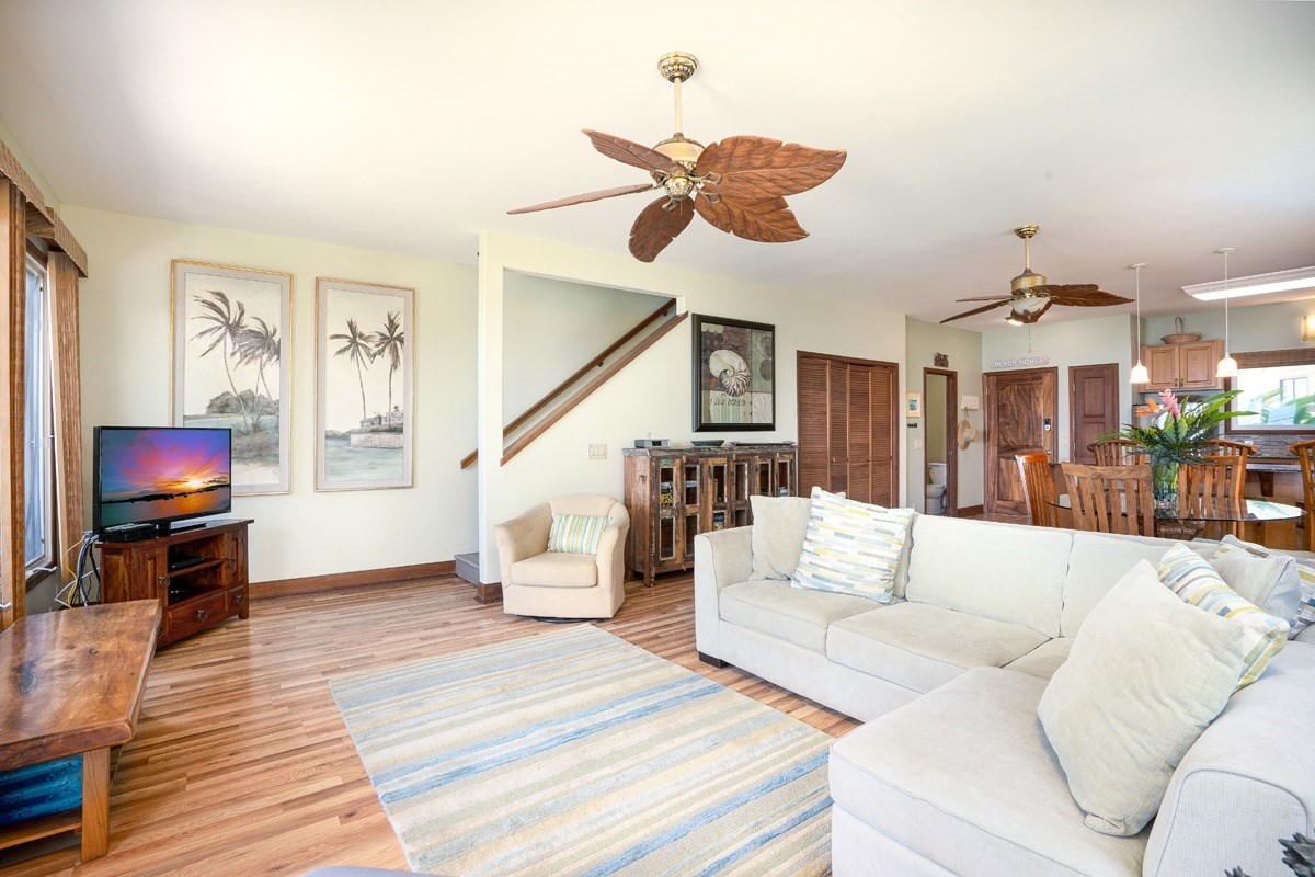 1871 Pe'e Road, Unit 2 Koloa, HI 96756 - Photo 8 of 25 a living room with furniture and wooden floor