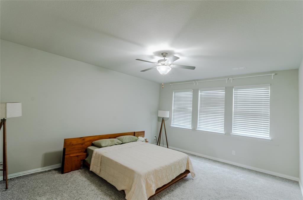 1448 Pebble Way Allen, TX 75013 - Photo 11 of 25 a bedroom with a bed and window