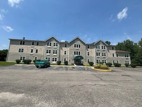 a view of multiple houses with a street
