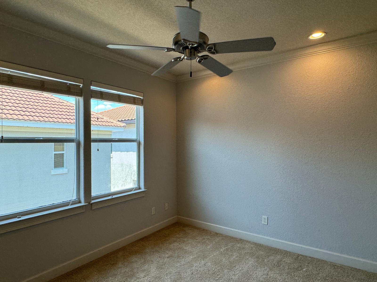 241 Inverrary Drive Destin, FL 32541 - Photo 17 of 24 a view of an empty room with a window