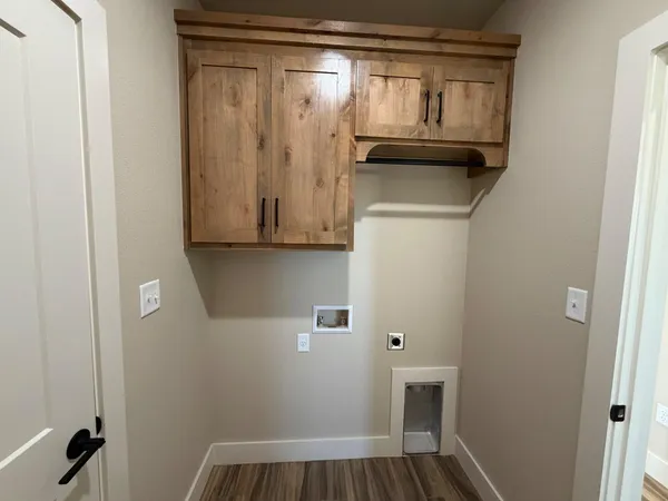 a view of bathroom with washer and dryer