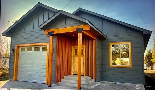 a front view of a house with a glass door