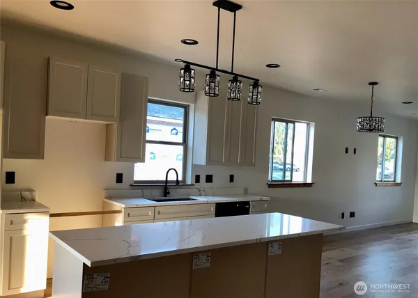 a bathroom with a sink and mirror