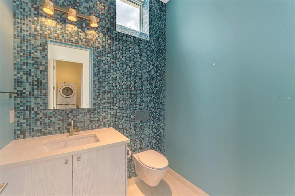 7410 Manasota Key Road Englewood, FL 34223 - Photo 17 of 45 a bathroom with a sink and a toilet