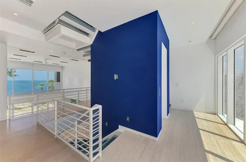 a view of kitchen with furniture and window