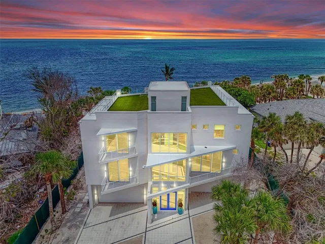 a front view of a house with outdoor space