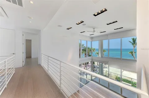 a view of a balcony with furniture