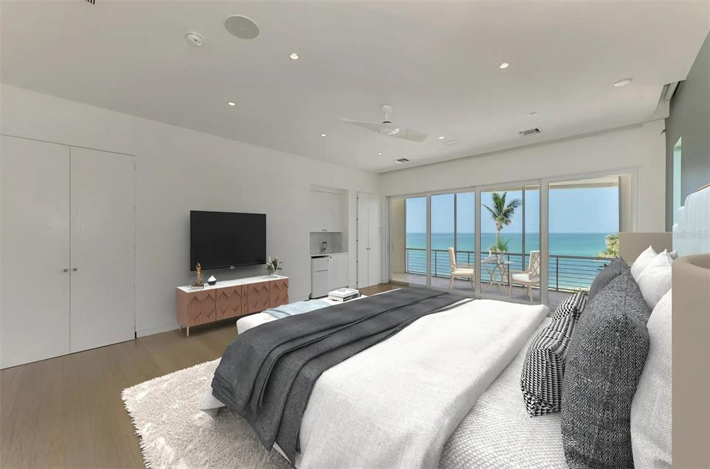 7410 Manasota Key Road Englewood, FL 34223 - Photo 23 of 45 a bedroom with a bed and a flat screen tv