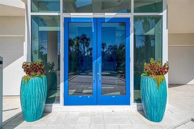 a room with a flower garden and entryway