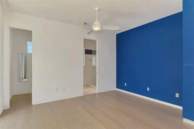 an empty room with a bathroom