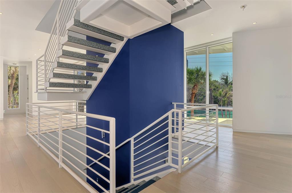7410 Manasota Key Road Englewood, FL 34223 - Photo 4 of 45 a view of entryway and hall with wooden floor