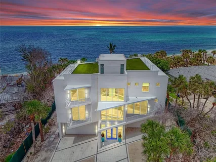 a front view of a house with outdoor space