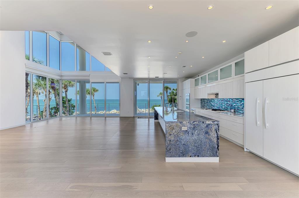 7410 Manasota Key Road Englewood, FL 34223 - Photo 9 of 45 a living room with furniture and a table