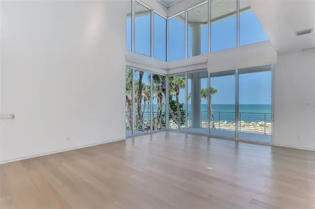 a view of an entryway with wooden floor