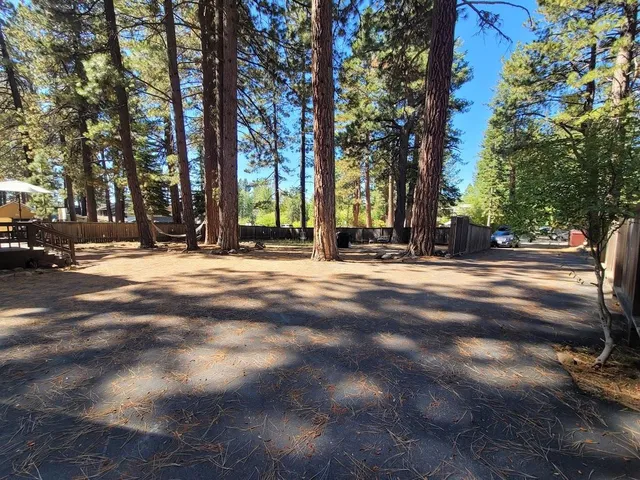 a view of swimming pool with a patio