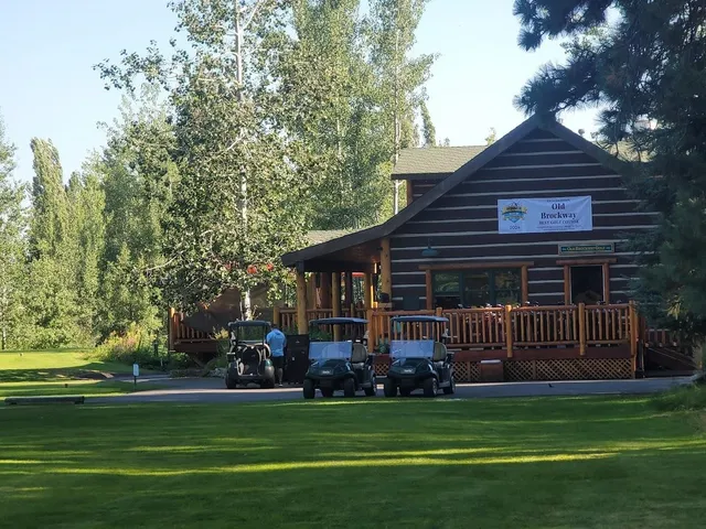 a view of a backyard with table and chairs