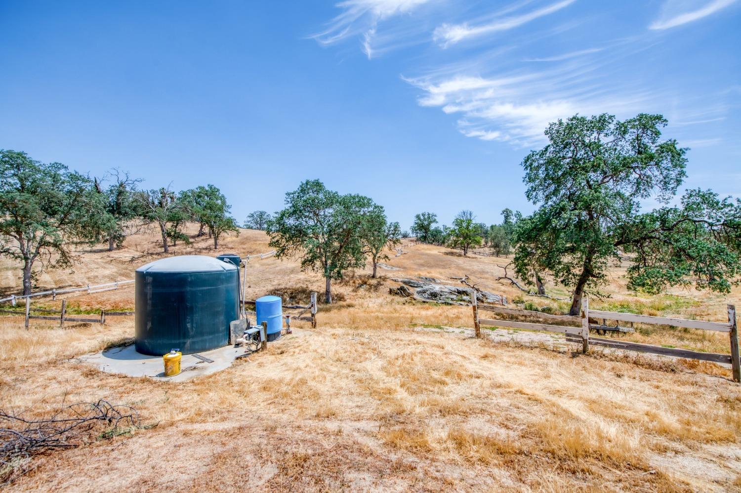 22452 Goldrush Lane Clovis, CA 93619 - Photo 30 of 36 a view of a street with a building in the background