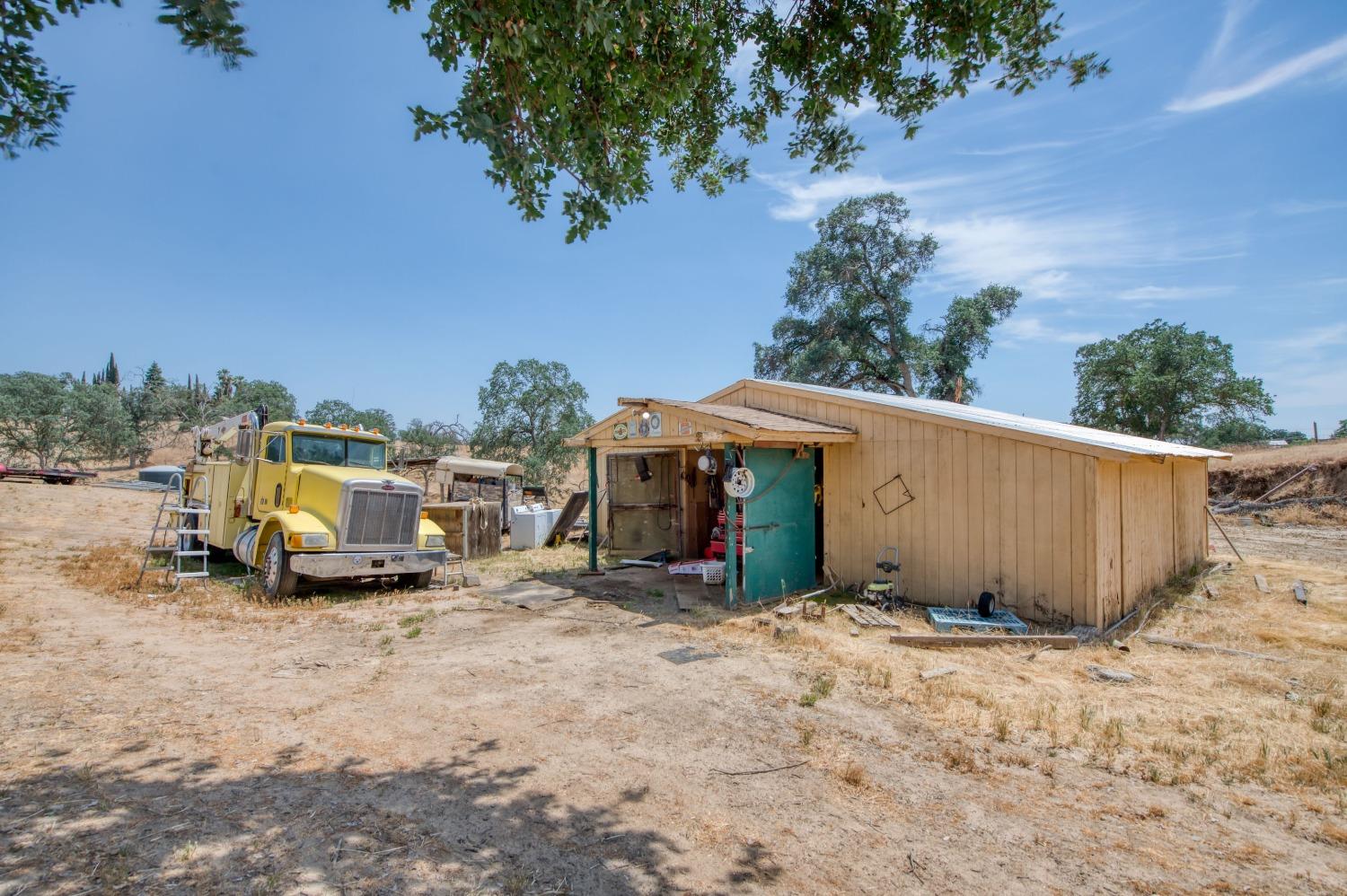 22452 Goldrush Lane Clovis, CA 93619 - Photo 33 of 36 a view of outdoor space with deck and barbeque oven