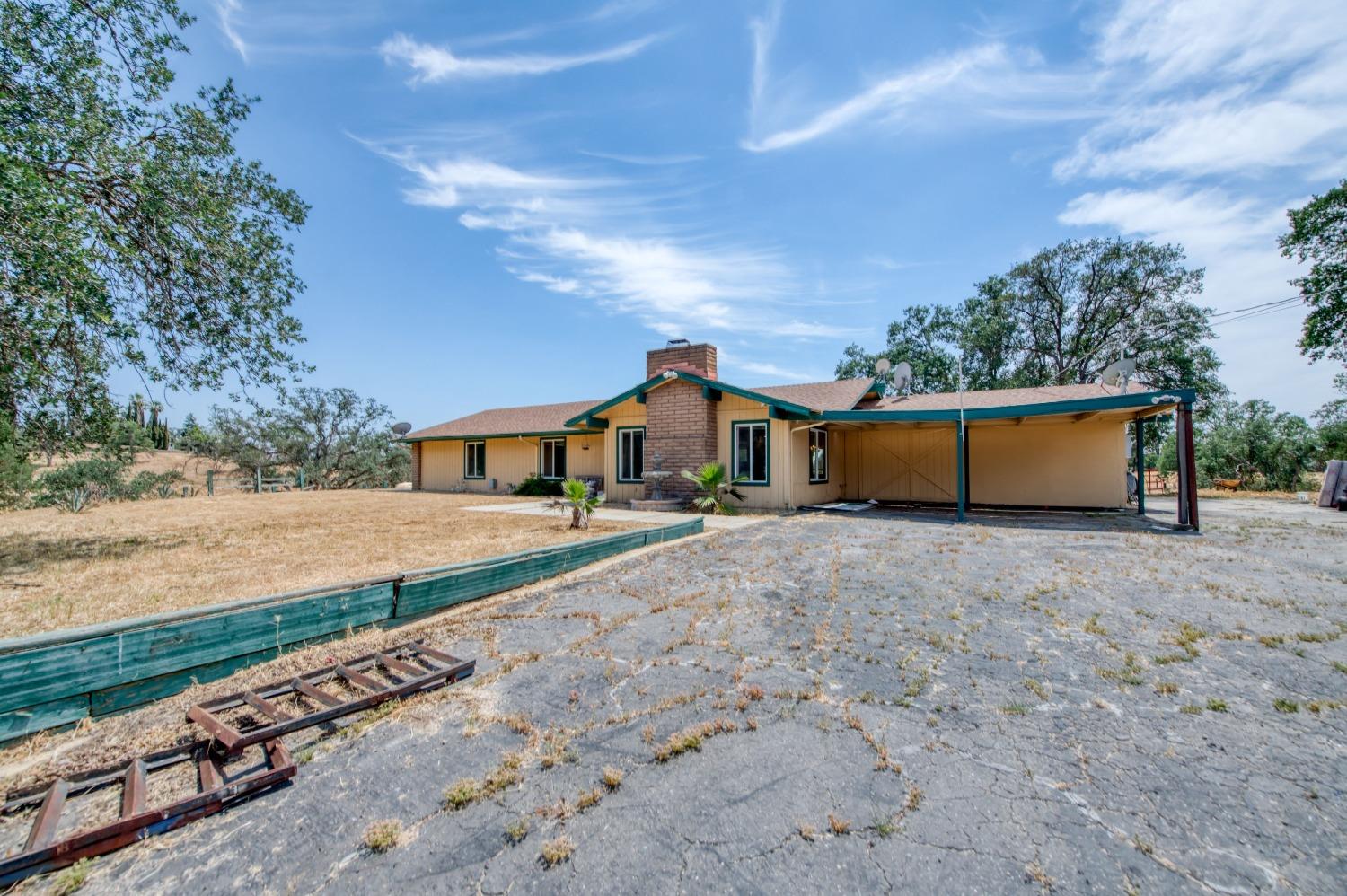 22452 Goldrush Lane Clovis, CA 93619 - Photo 34 of 36 a front view of house with yard