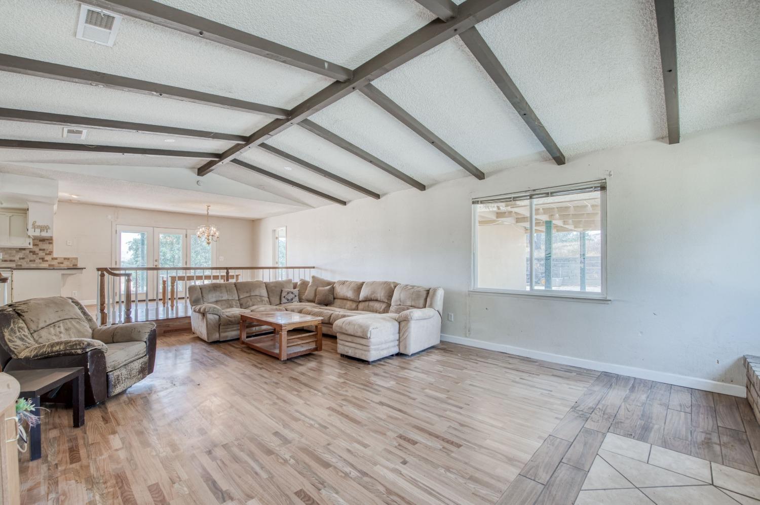 22452 Goldrush Lane Clovis, CA 93619 - Photo 6 of 36 a living room with furniture