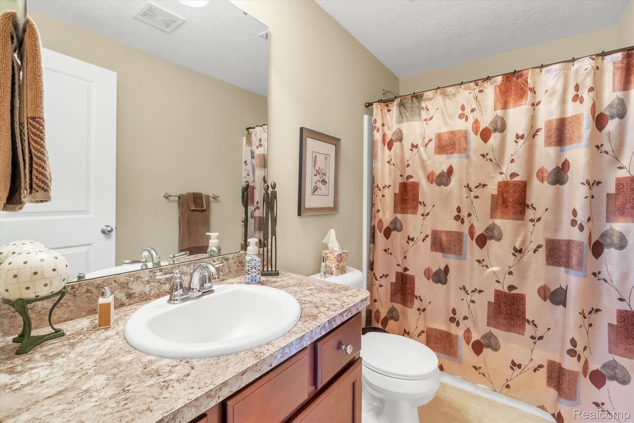 905 Spirea Howell, MI 48843 - Photo 20 of 35 Basement bathroom with tub