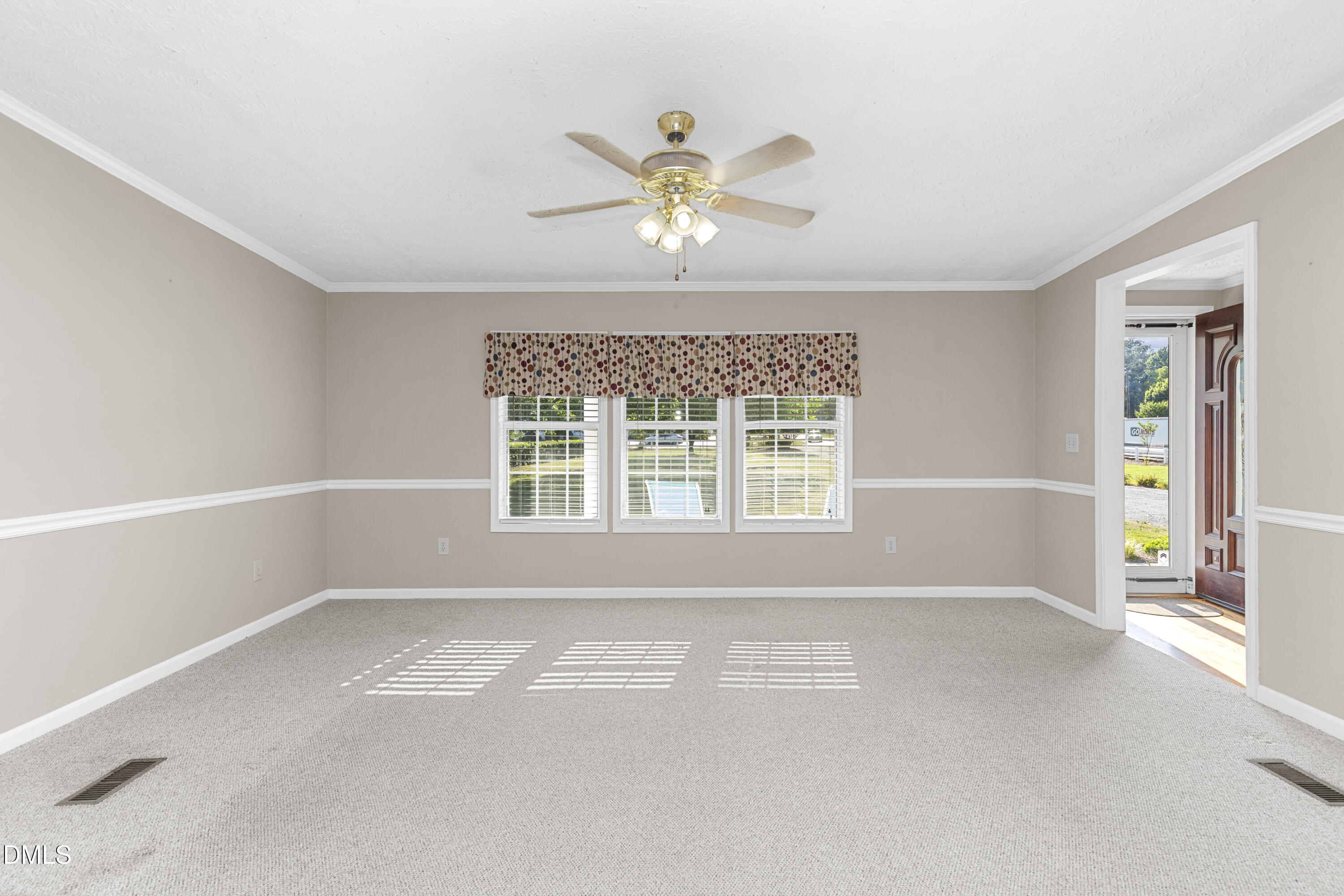 199 Iris Bryant Road Erwin, NC 28339 - Photo 4 of 33 a view of an empty room with a window
