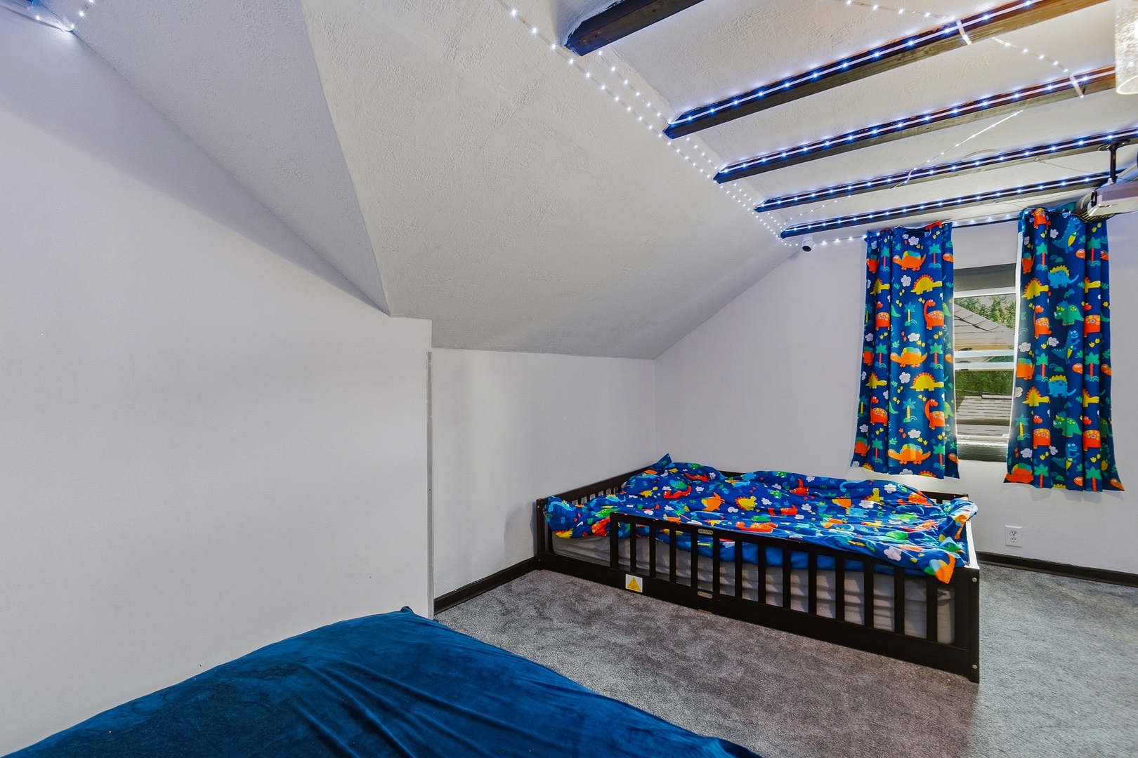 937 25th Street Moline, IL 61265 - Photo 26 of 49 a bedroom with a bed and a baby crib