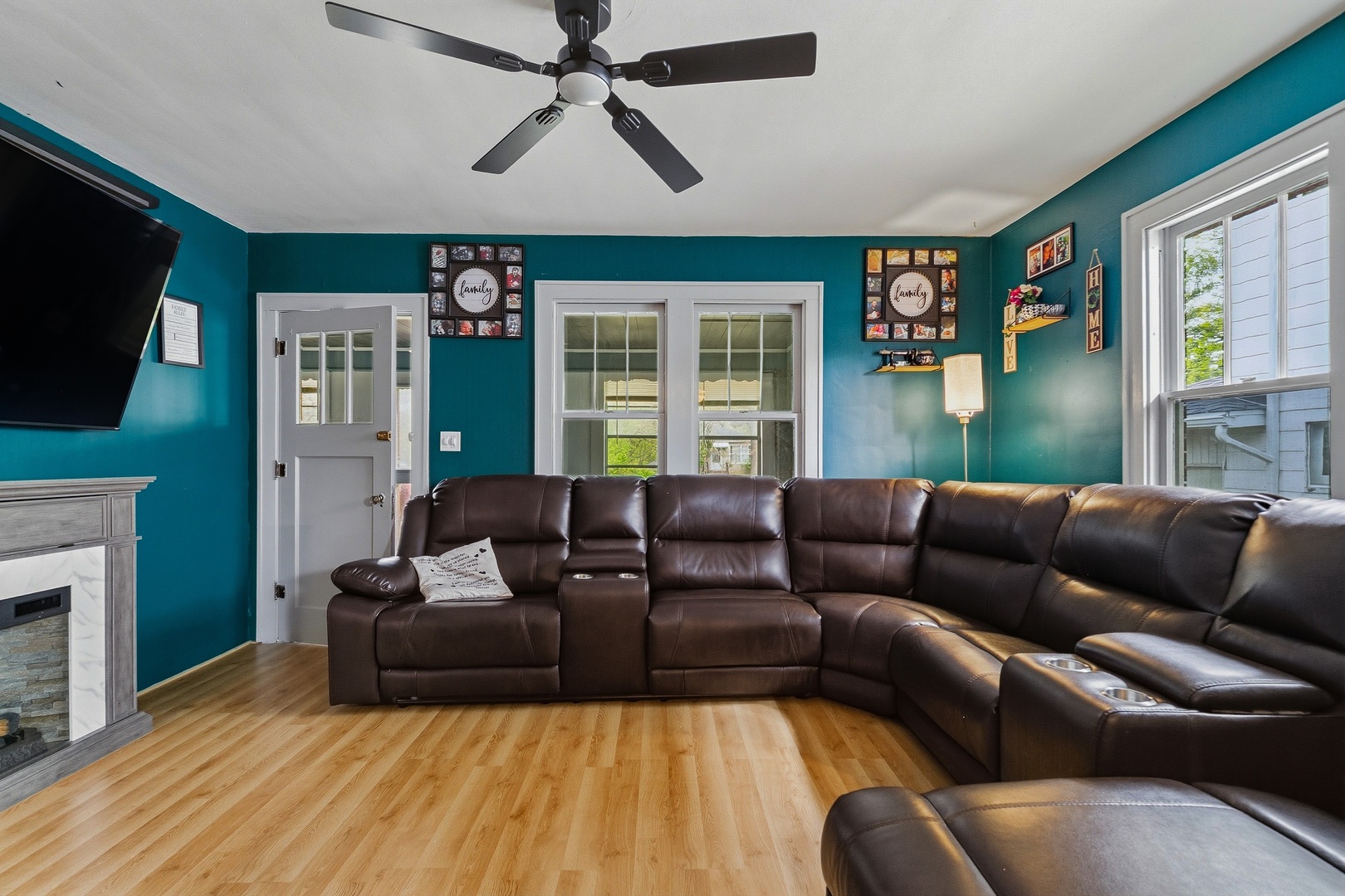937 25th Street Moline, IL 61265 - Photo 3 of 49 a living room with furniture and a flat screen tv
