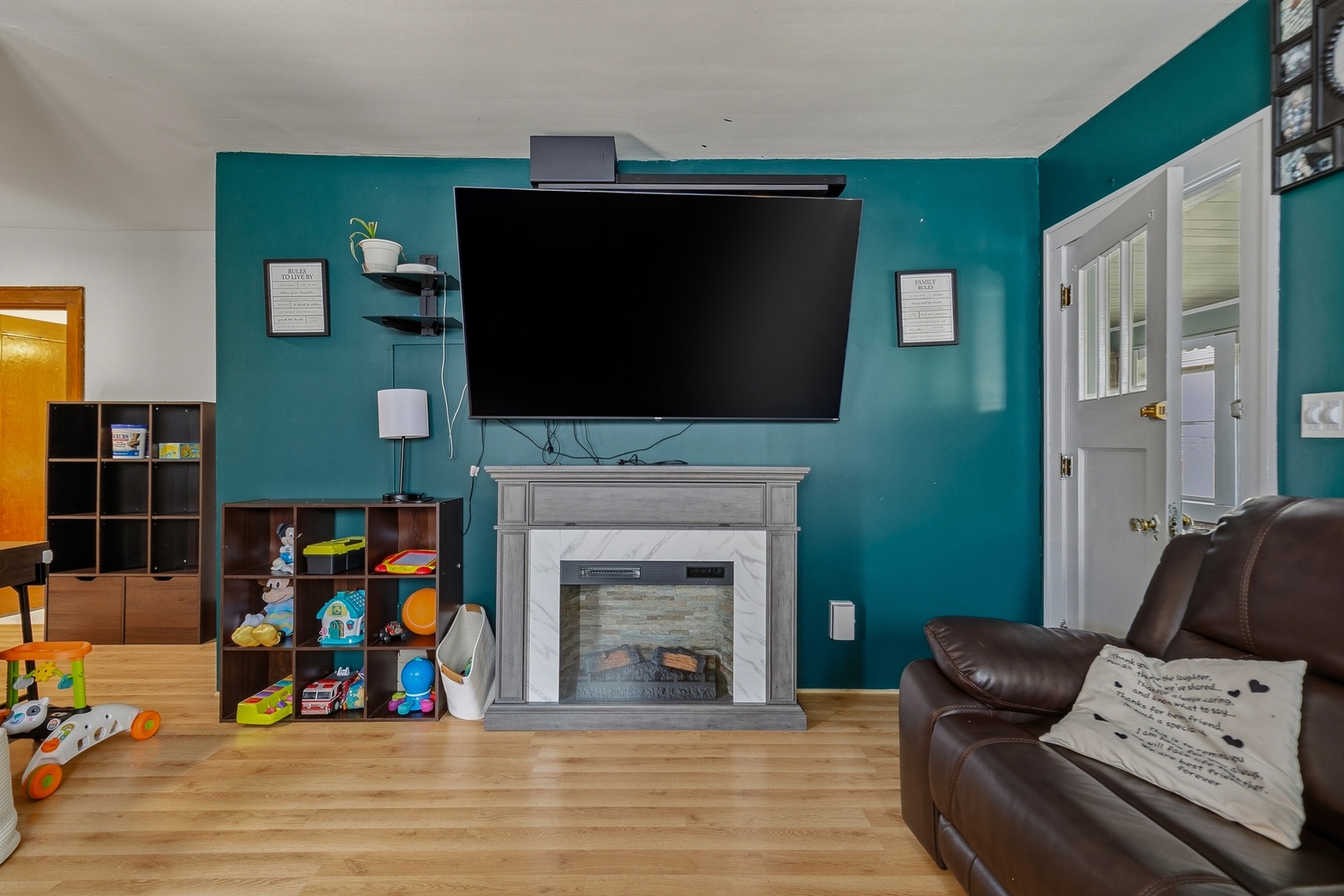 937 25th Street Moline, IL 61265 - Photo 4 of 49 a living room with furniture and a flat screen tv