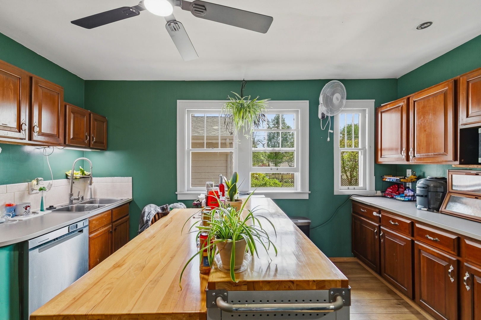 937 25th Street Moline, IL 61265 - Photo 6 of 49 a kitchen with sink a window and cabinets