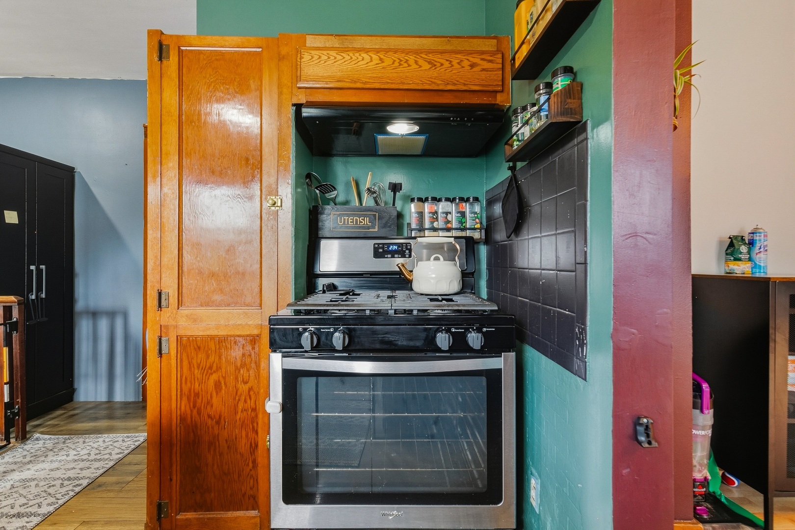 937 25th Street Moline, IL 61265 - Photo 10 of 49 a stove top oven sitting inside of a kitchen