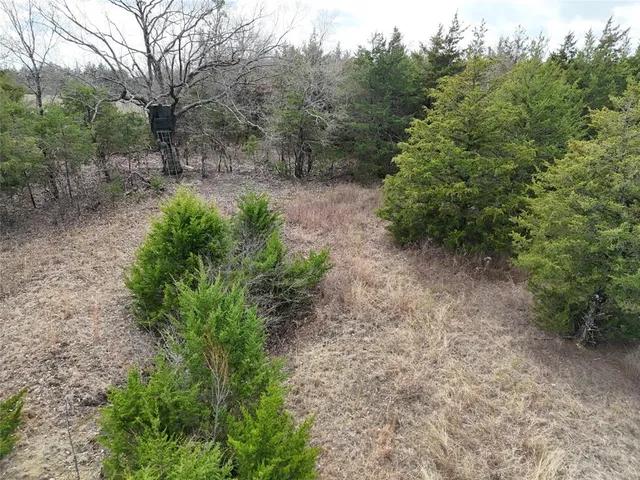 a view of a field with an outdoor space