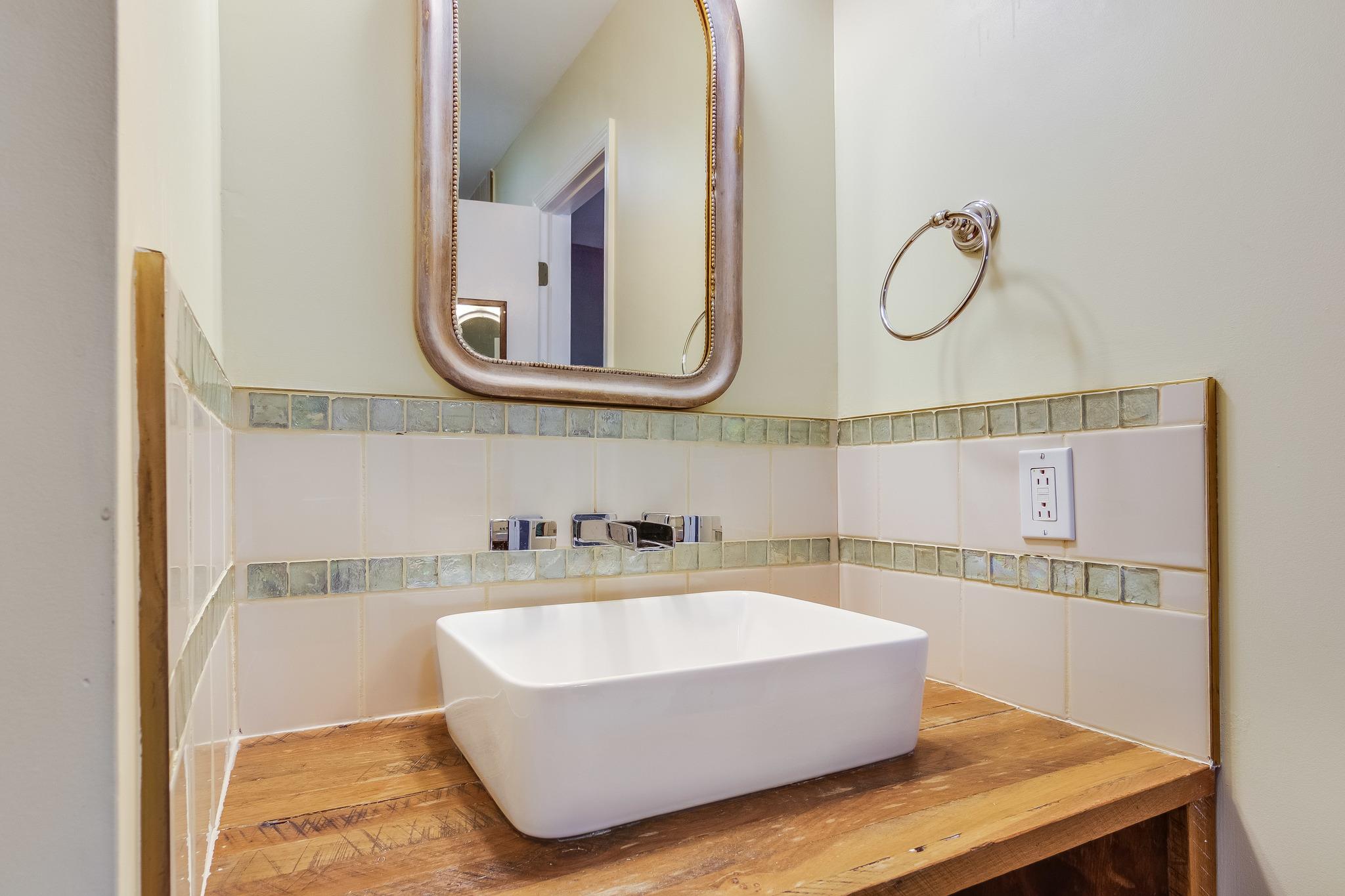 1518 Avon Road Murfreesboro, TN 37129 - Photo 13 of 22 a bathroom with a bathtub and mirror