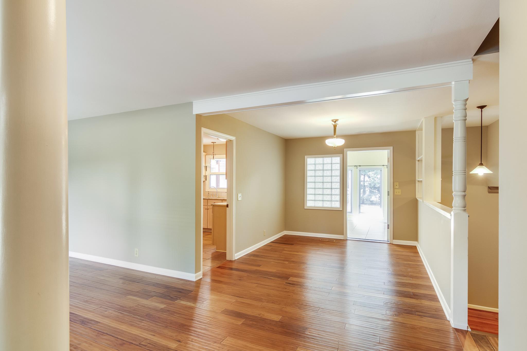 1518 Avon Road Murfreesboro, TN 37129 - Photo 4 of 22 a view of an empty room with wooden floor and a window