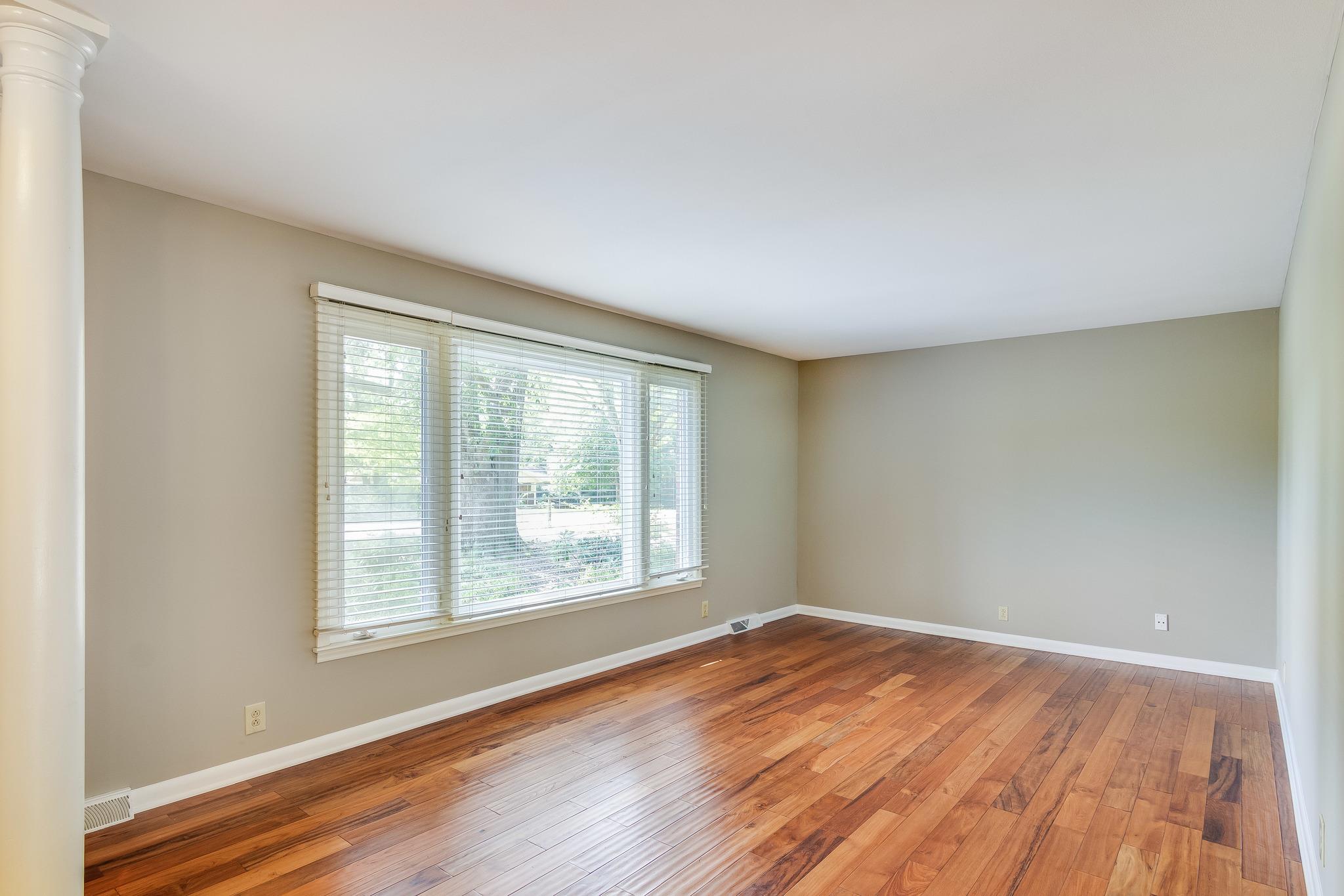 1518 Avon Road Murfreesboro, TN 37129 - Photo 5 of 22 an empty room with wooden floor and windows