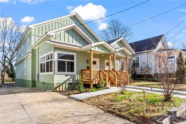 a front view of a house with parking