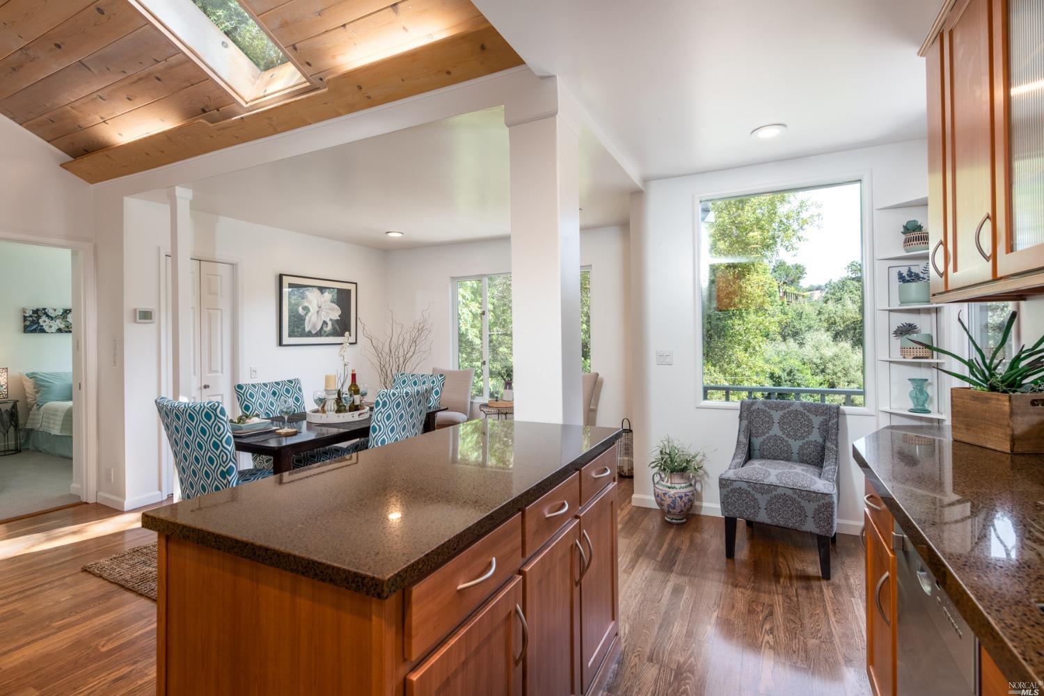 85 Spruce Road Fairfax, CA 94930 - Photo 1 of 1 a living room with furniture and a large window