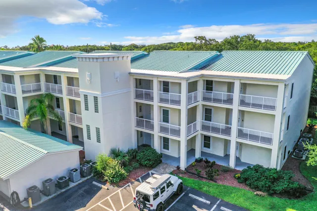 a view of a building with a garden