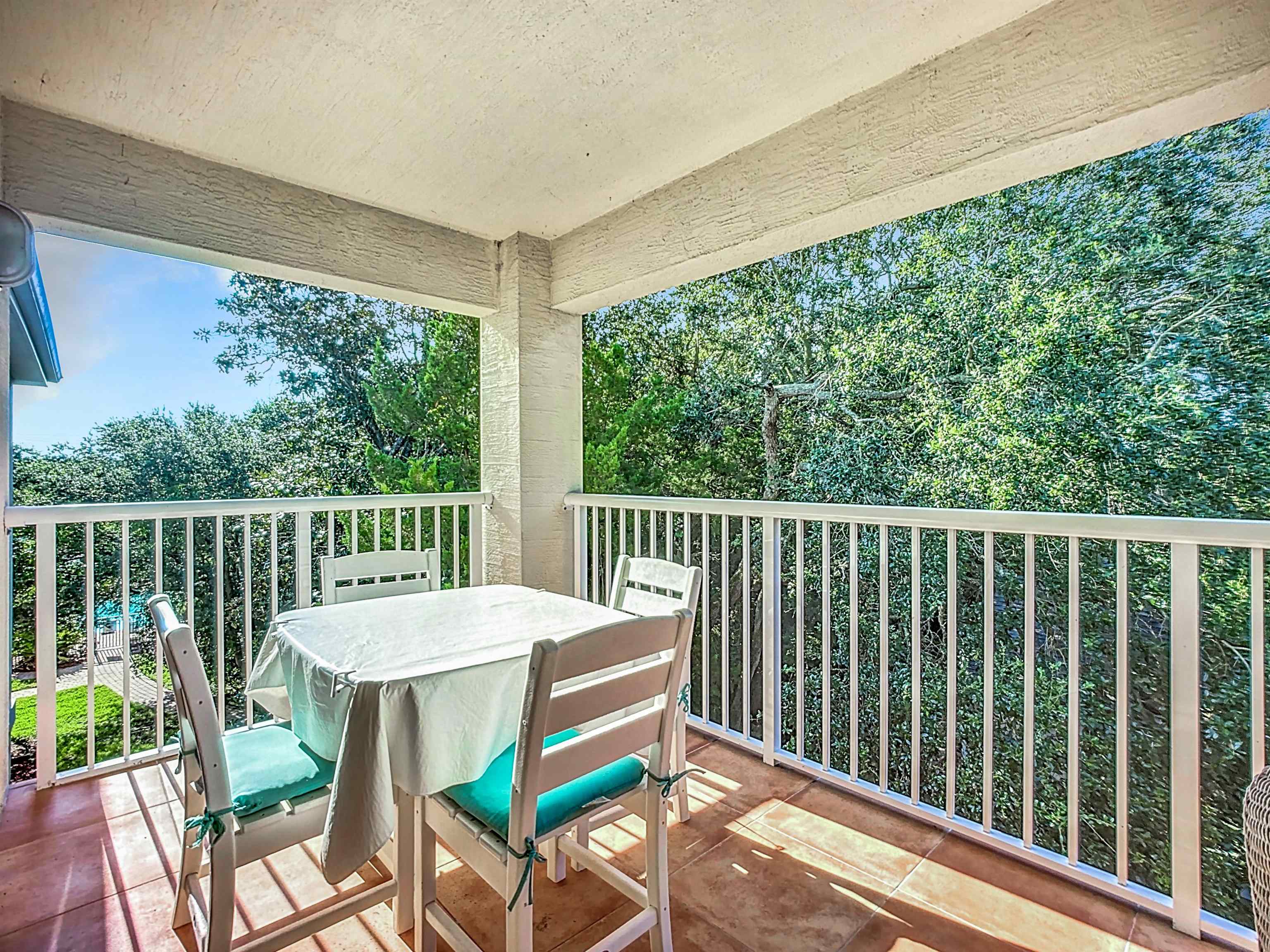 931 A1A Beach Boulevard, Unit 306 St. Augustine, FL 32080 - Photo 32 of 47 a view of a two chairs in the deck