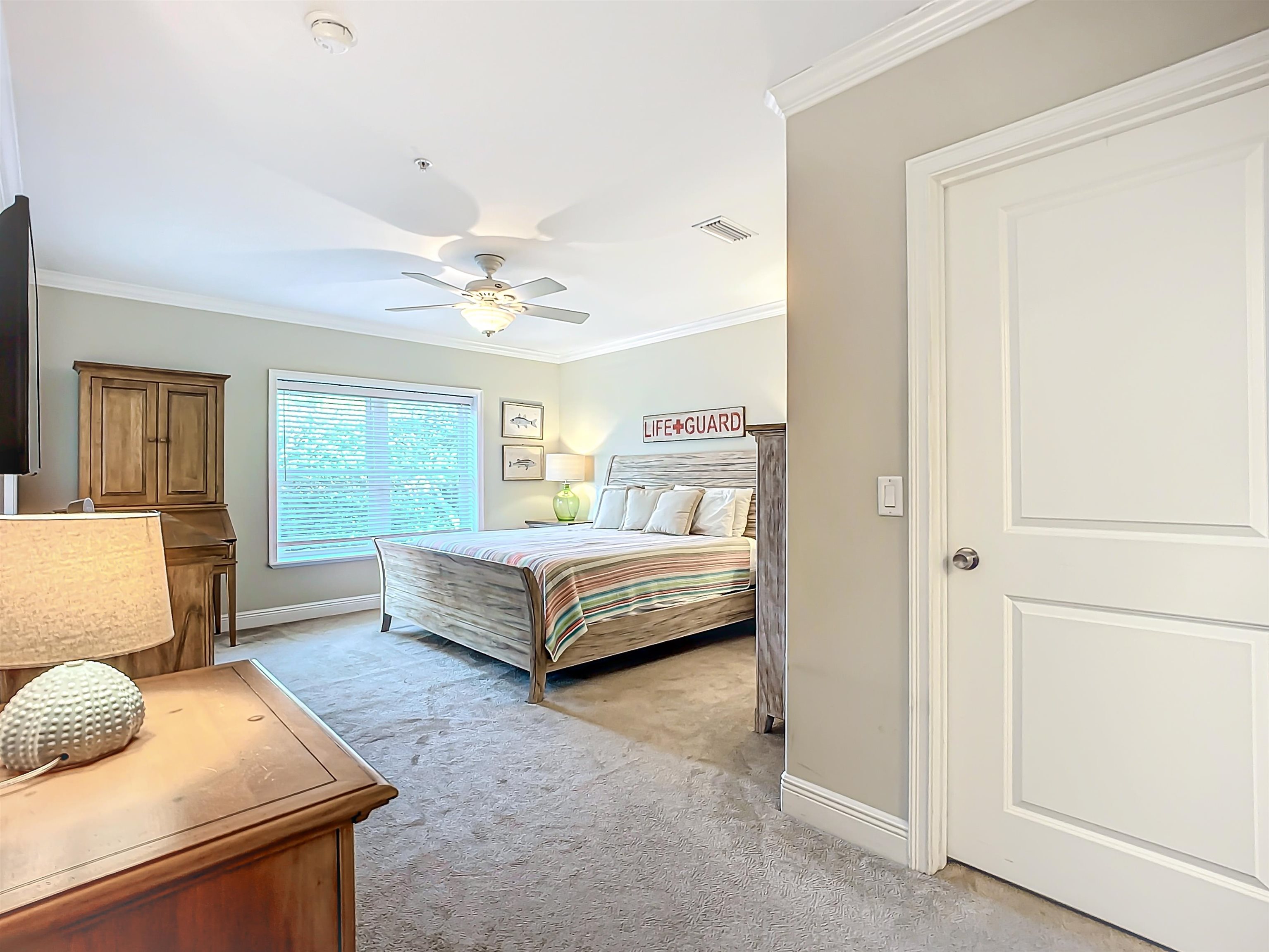 931 A1A Beach Boulevard, Unit 306 St. Augustine, FL 32080 - Photo 35 of 47 a bedroom with a bed and window