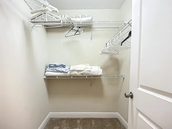 a bathroom with a tub and shower