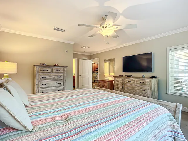 a bathroom with a tub a double vanity sink and a mirror