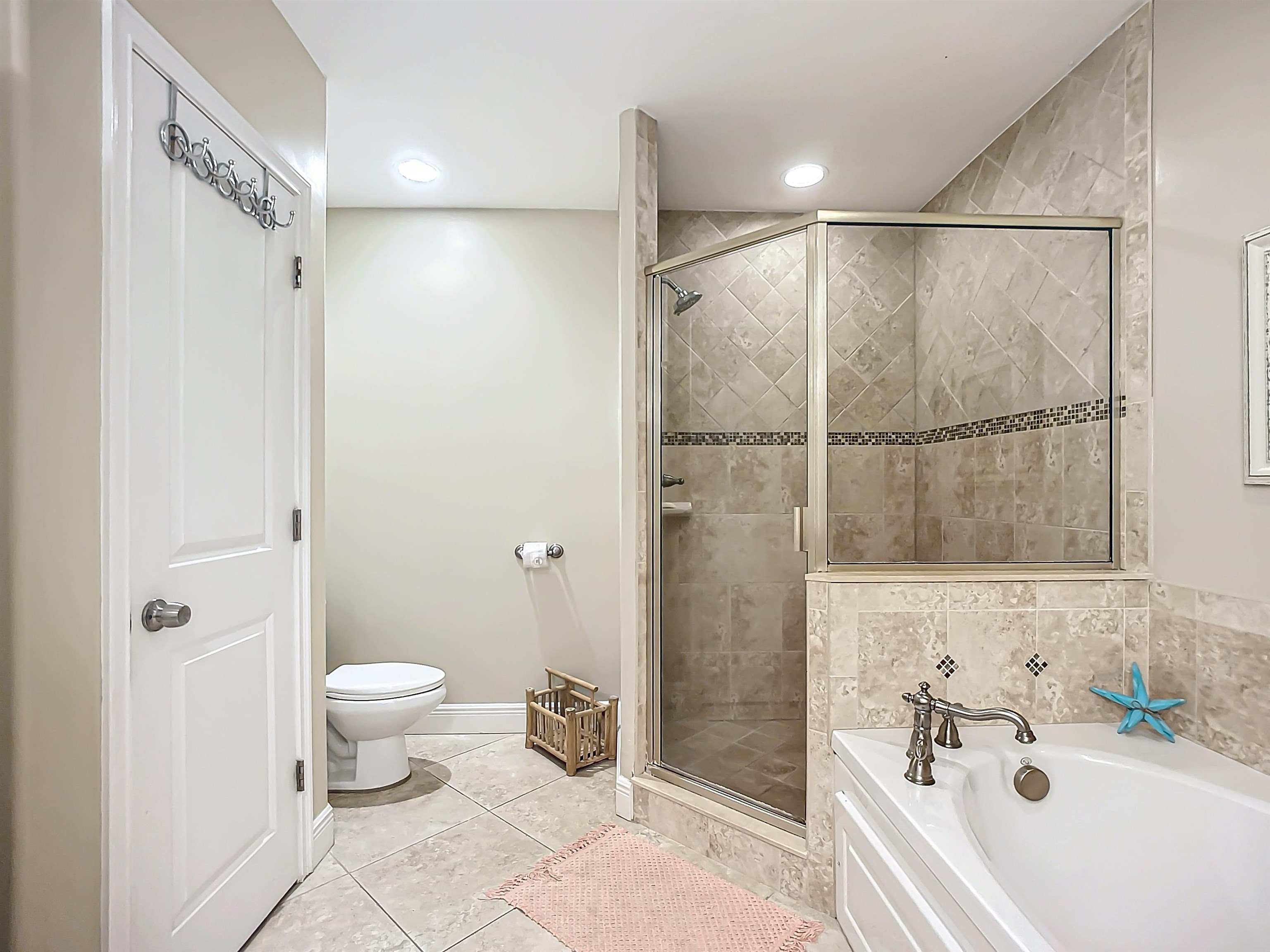 931 A1A Beach Boulevard, Unit 306 St. Augustine, FL 32080 - Photo 43 of 47 a bathroom with a sink toilet and shower