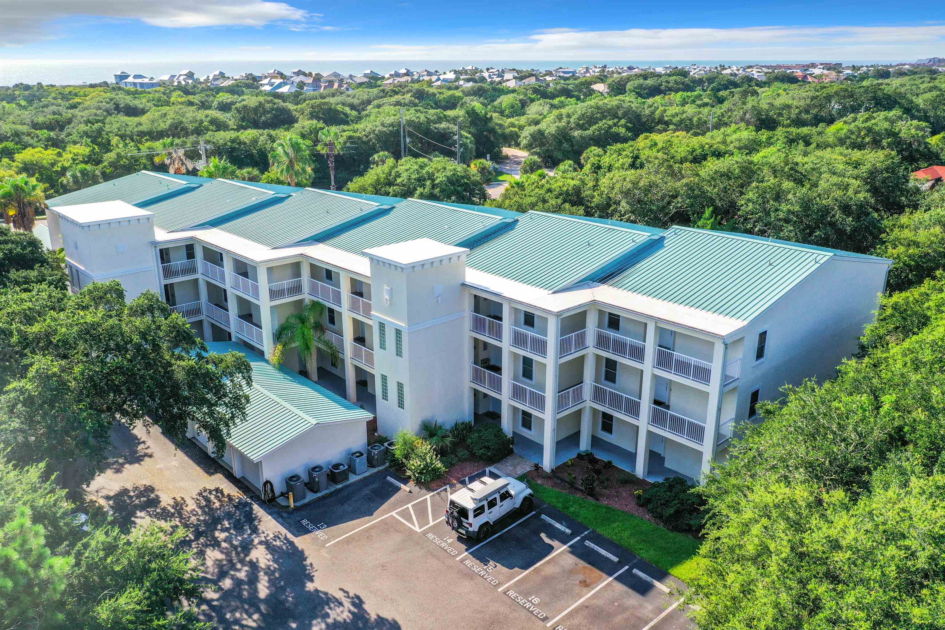931 A1A Beach Boulevard, Unit 306 St. Augustine, FL 32080 - Photo 44 of 47 an aerial view of a house