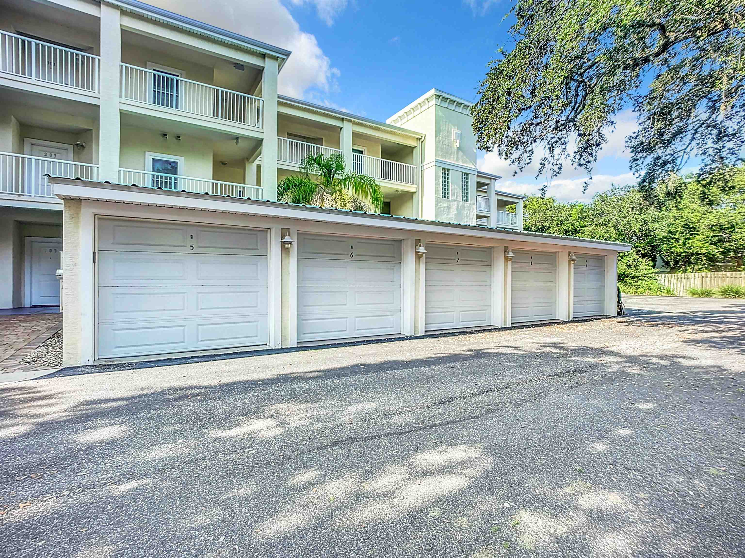 931 A1A Beach Boulevard, Unit 306 St. Augustine, FL 32080 - Photo 6 of 47 a front view of a house with a garage
