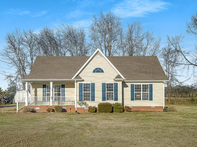 a big house with a big yard and more windows
