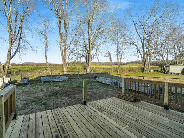 a view of a terrace with trees