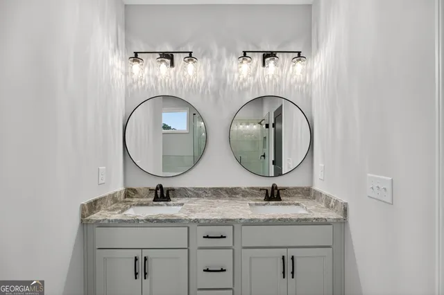 a bathroom with a bathtub and shower